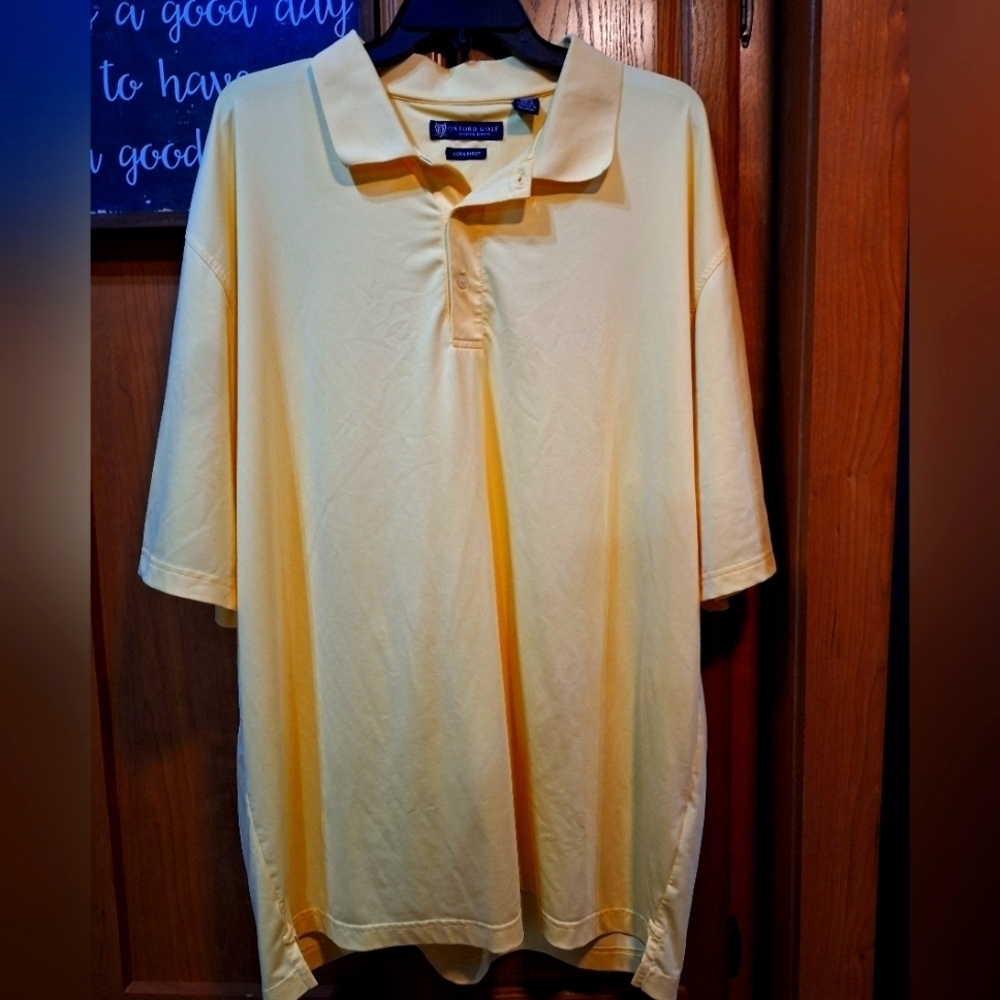 An Oxford Golf Super Dry Coolmax Creamy Yellow Polo Shirt In A Size XXL.